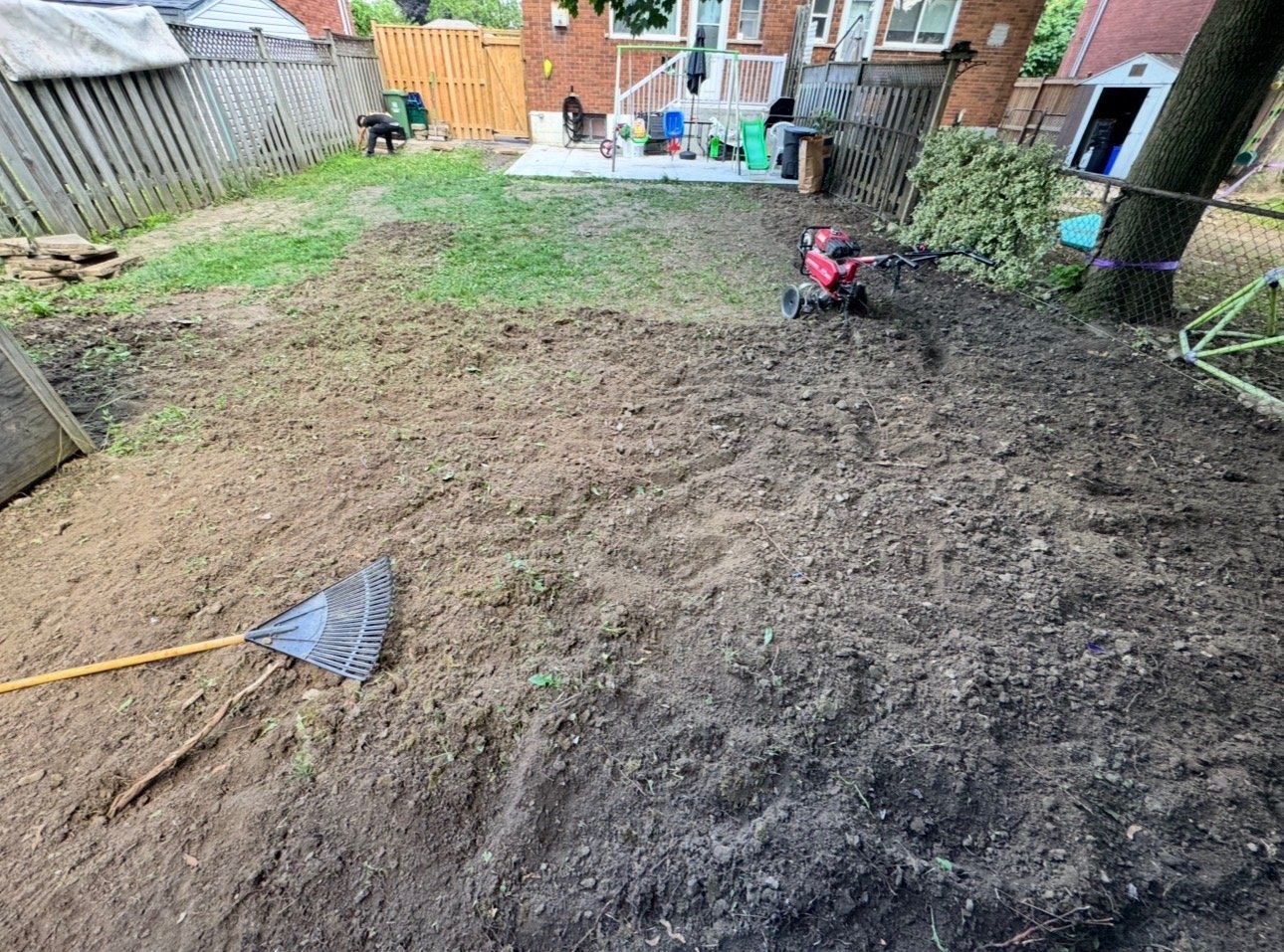 Soil preparation before sod installation in a GTA backyard